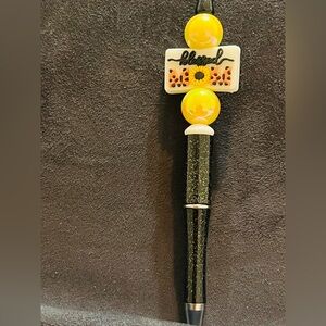 Black and Yellow Decorative Pen